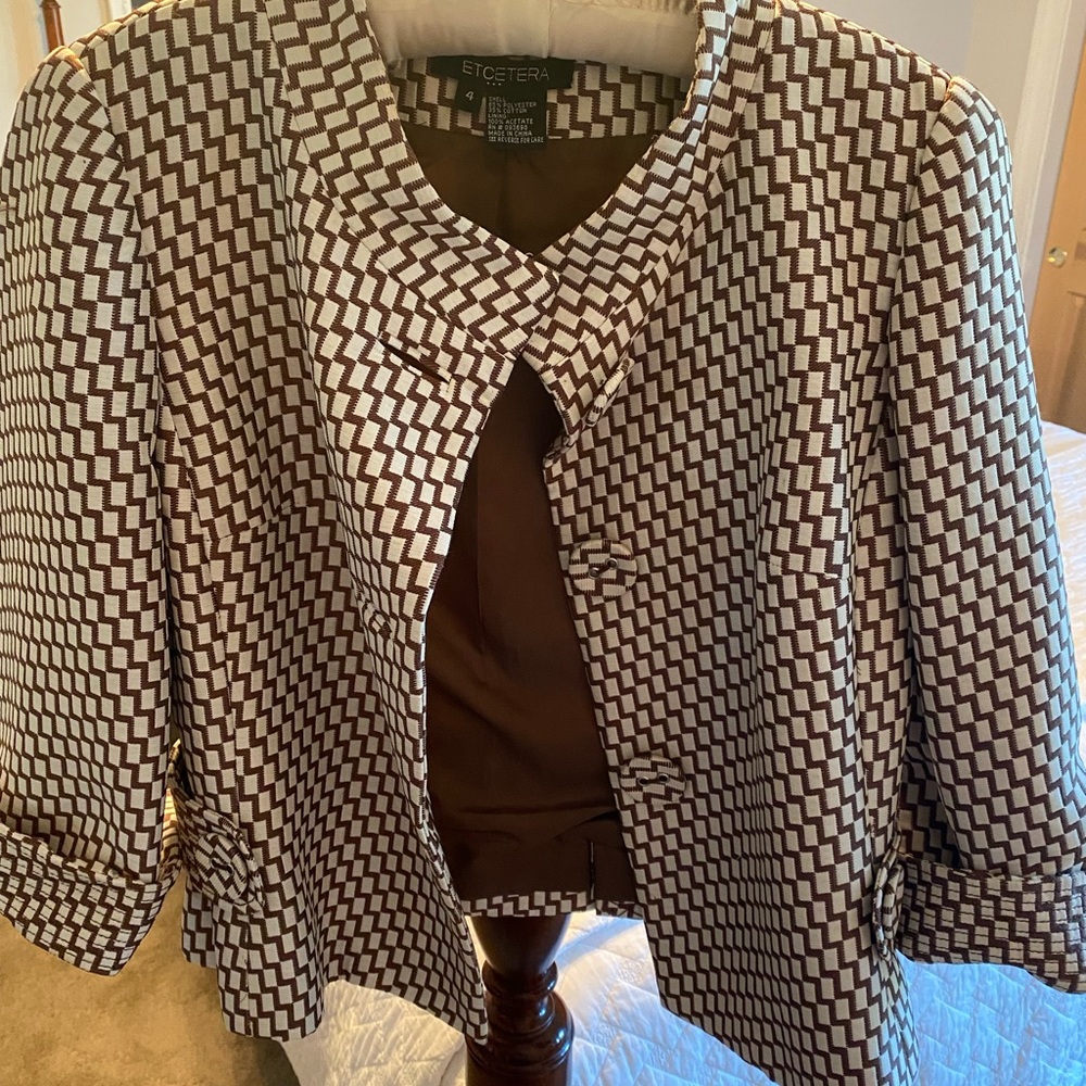 Etcetera jacket with tons of detailing